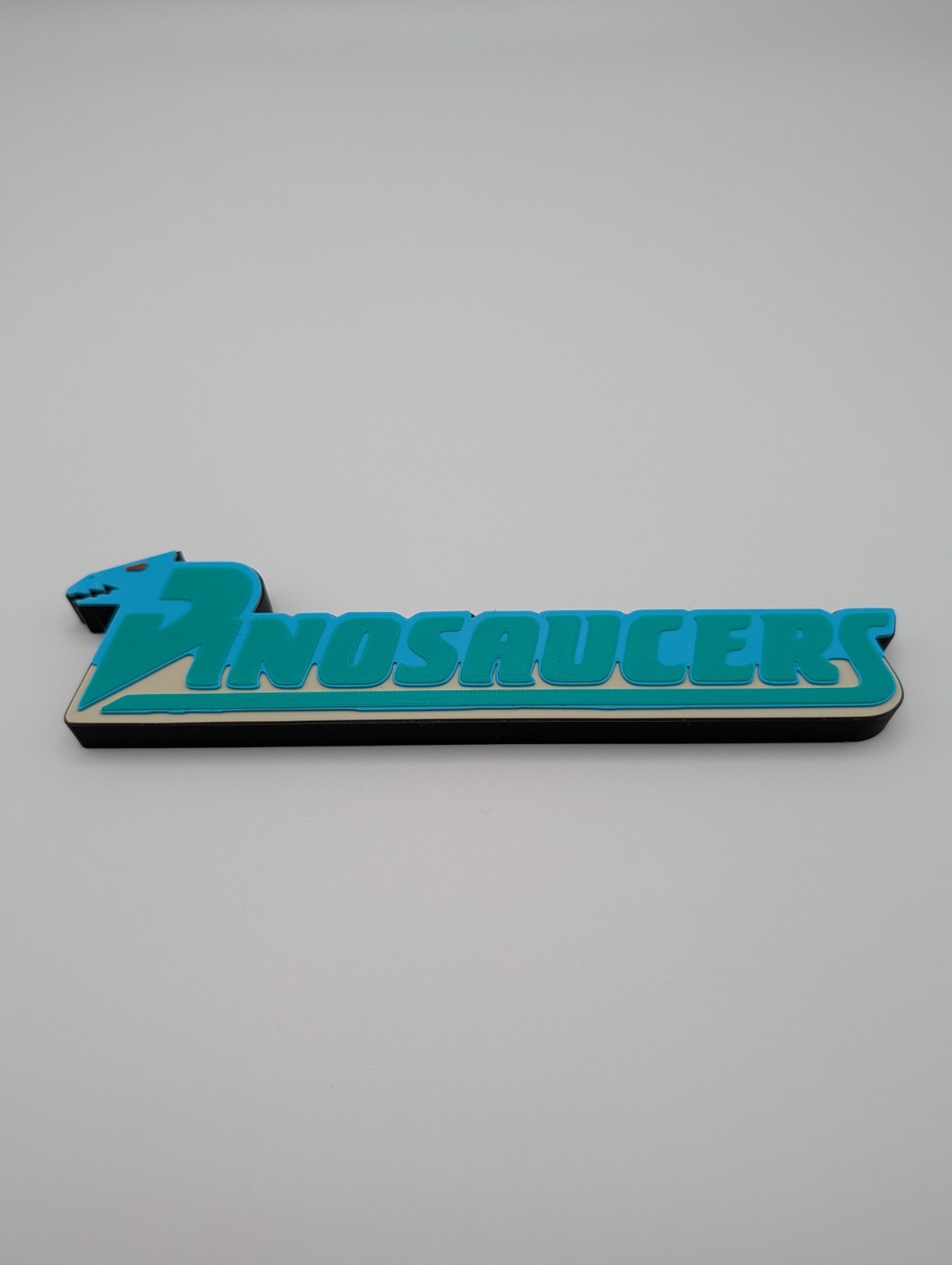 Dinosaucers Logo Display Sign For Collections