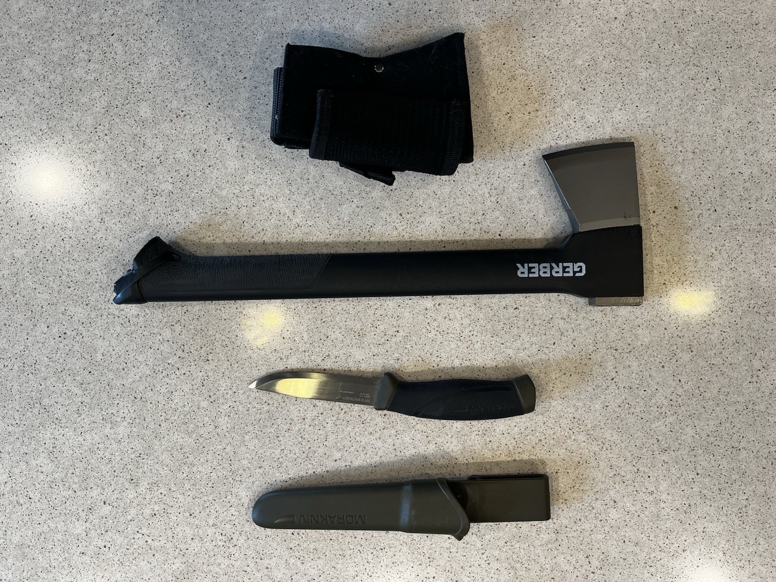 Gerber Hatchet Black Silver Plastic Handle with saw and a morakniv knife