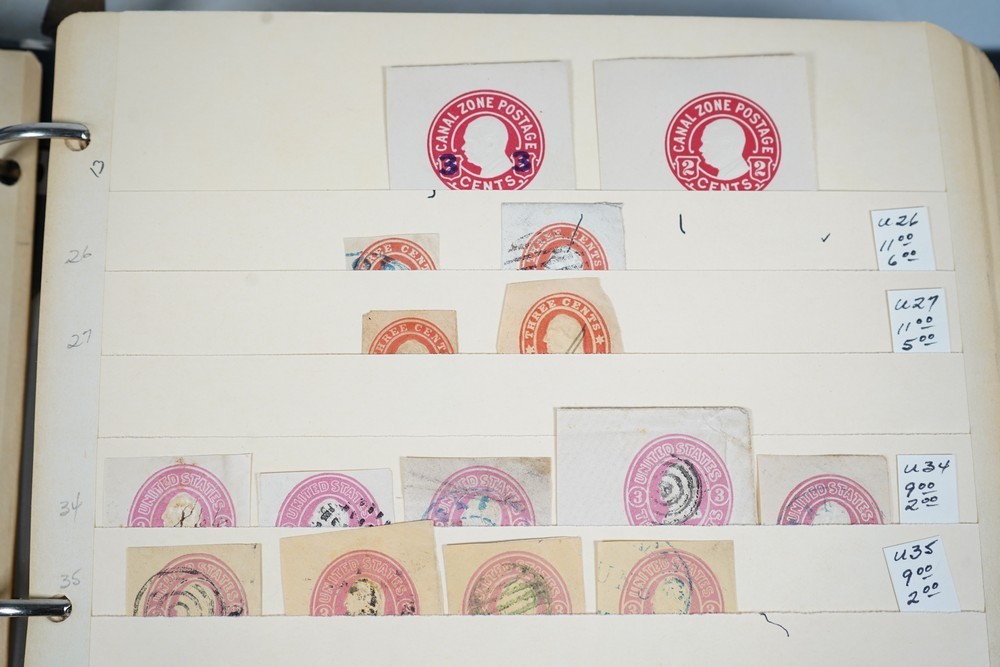 US COLLECTION OF 1,200+ STATIONERY CUT SQUARE STAMPS STORED IN STOCKBOOK