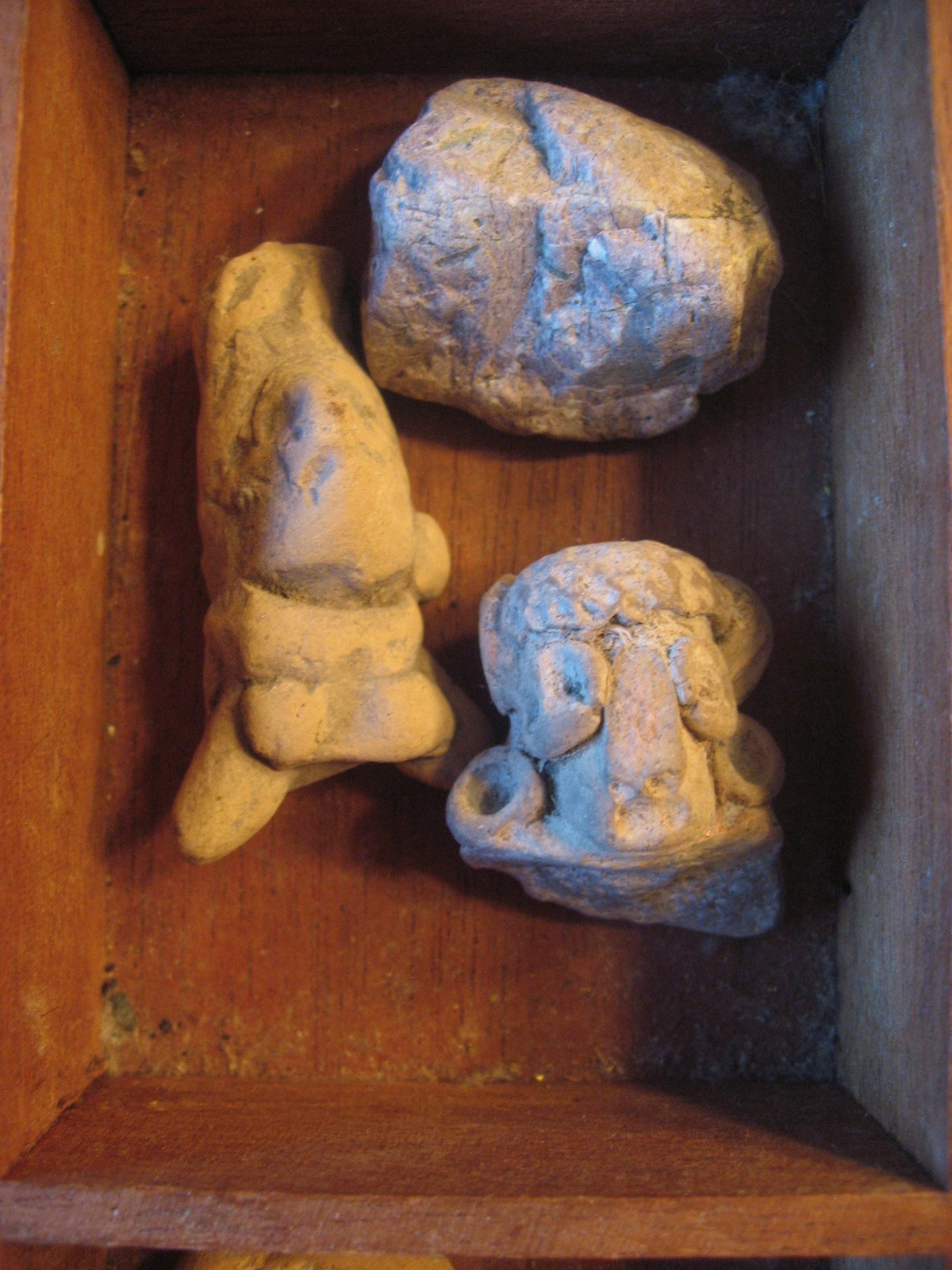 Antique Pre-Columbian Artifacts Box of 12 Hand Carved Stone Face Heads on Wood