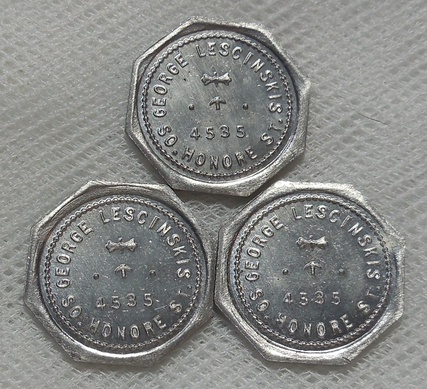 CHICAGO ILLINOIS GEORGE LESCINSKIS 4535 SO. HONOR ST. 5¢ 10¢ & 25¢ TRADE TOKENS