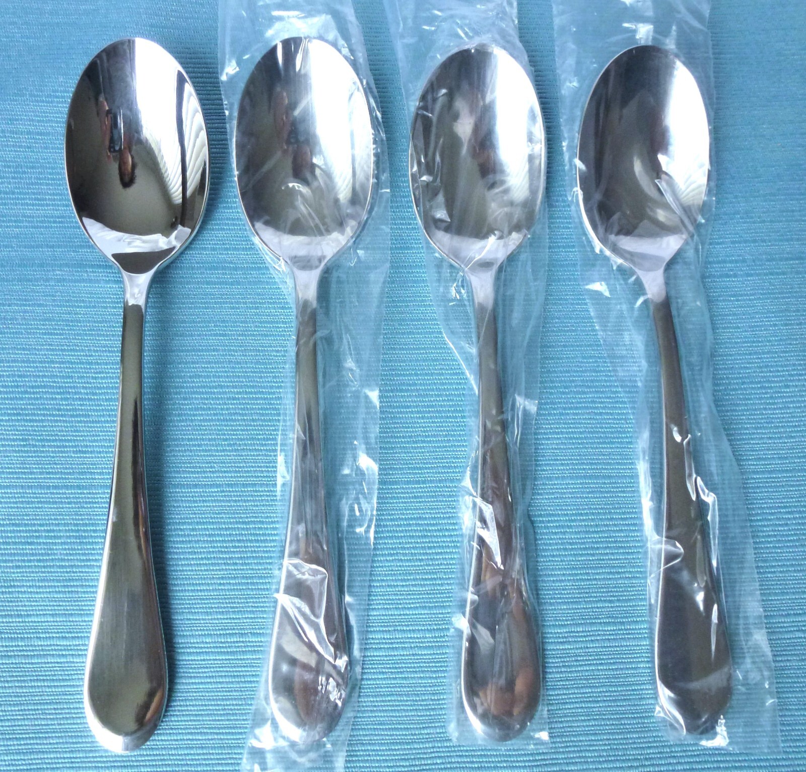 New Oneida ICARUS Glossy Set of 4 Lg Oval Soup Spoons Stainless Flatware(7 7/8")
