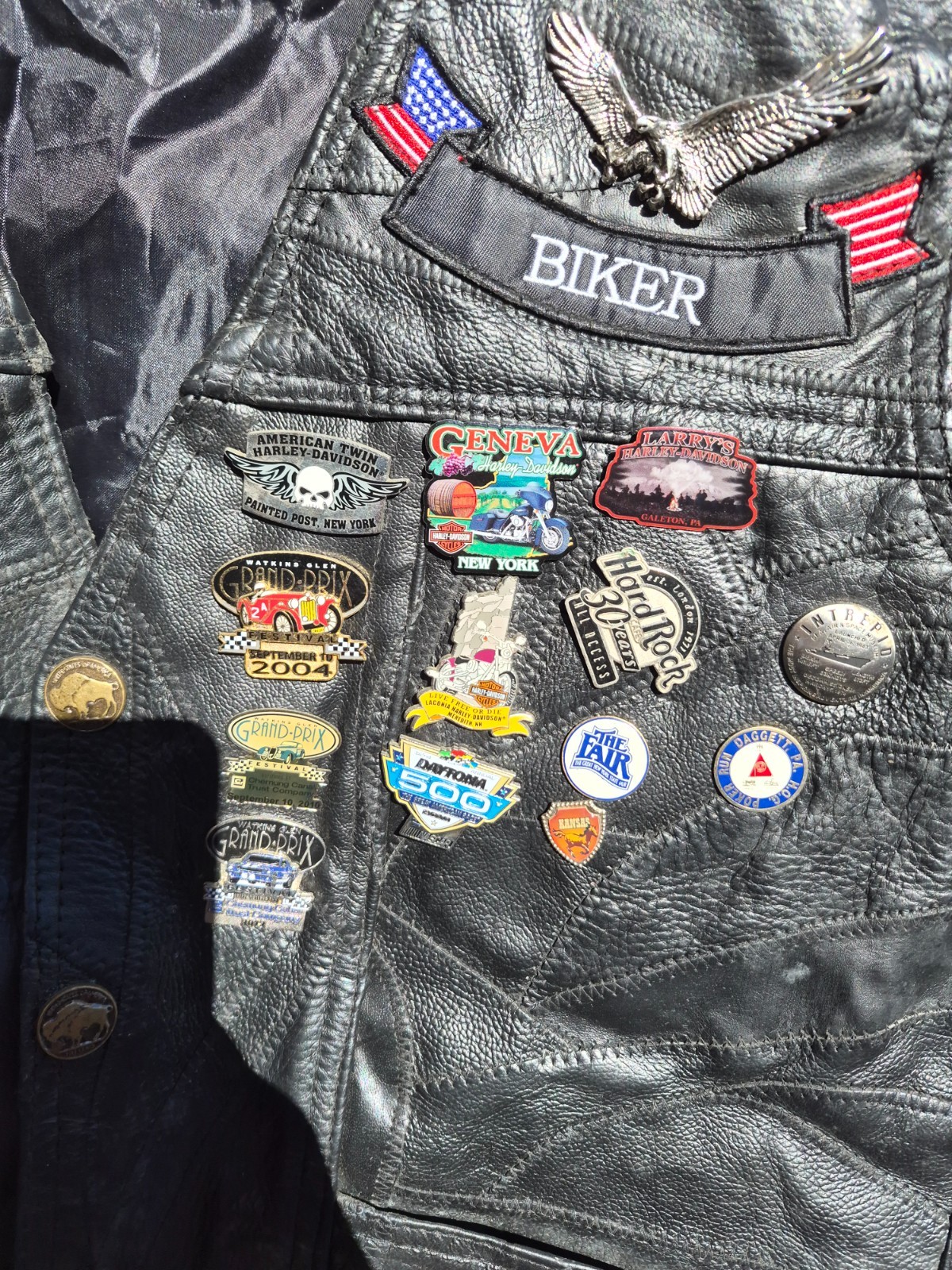 Vintage harley hog leather vest filled with pins and has patches 2xl