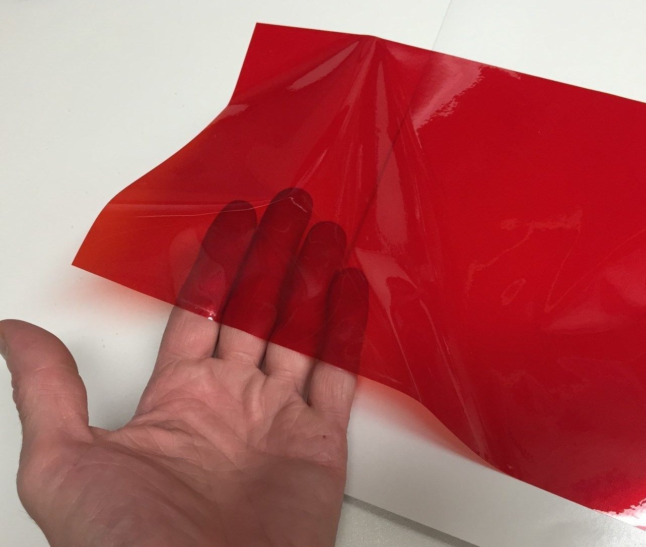 Long-Life RED Transparent Vinyl 24 inch x 10 ft, adhesive coated plastic film