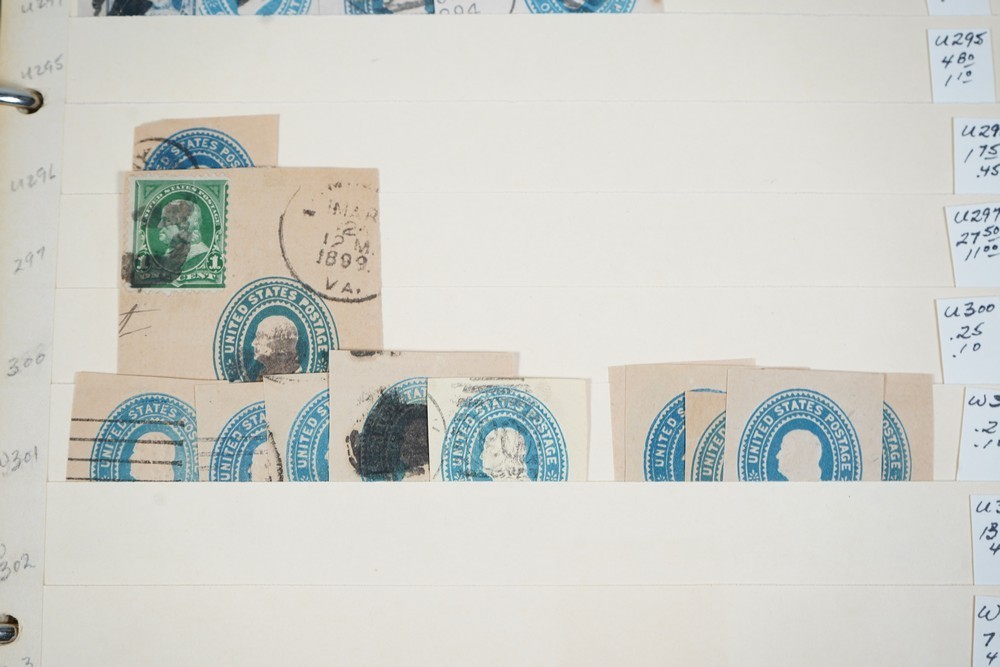 US COLLECTION OF 1,200+ STATIONERY CUT SQUARE STAMPS STORED IN STOCKBOOK