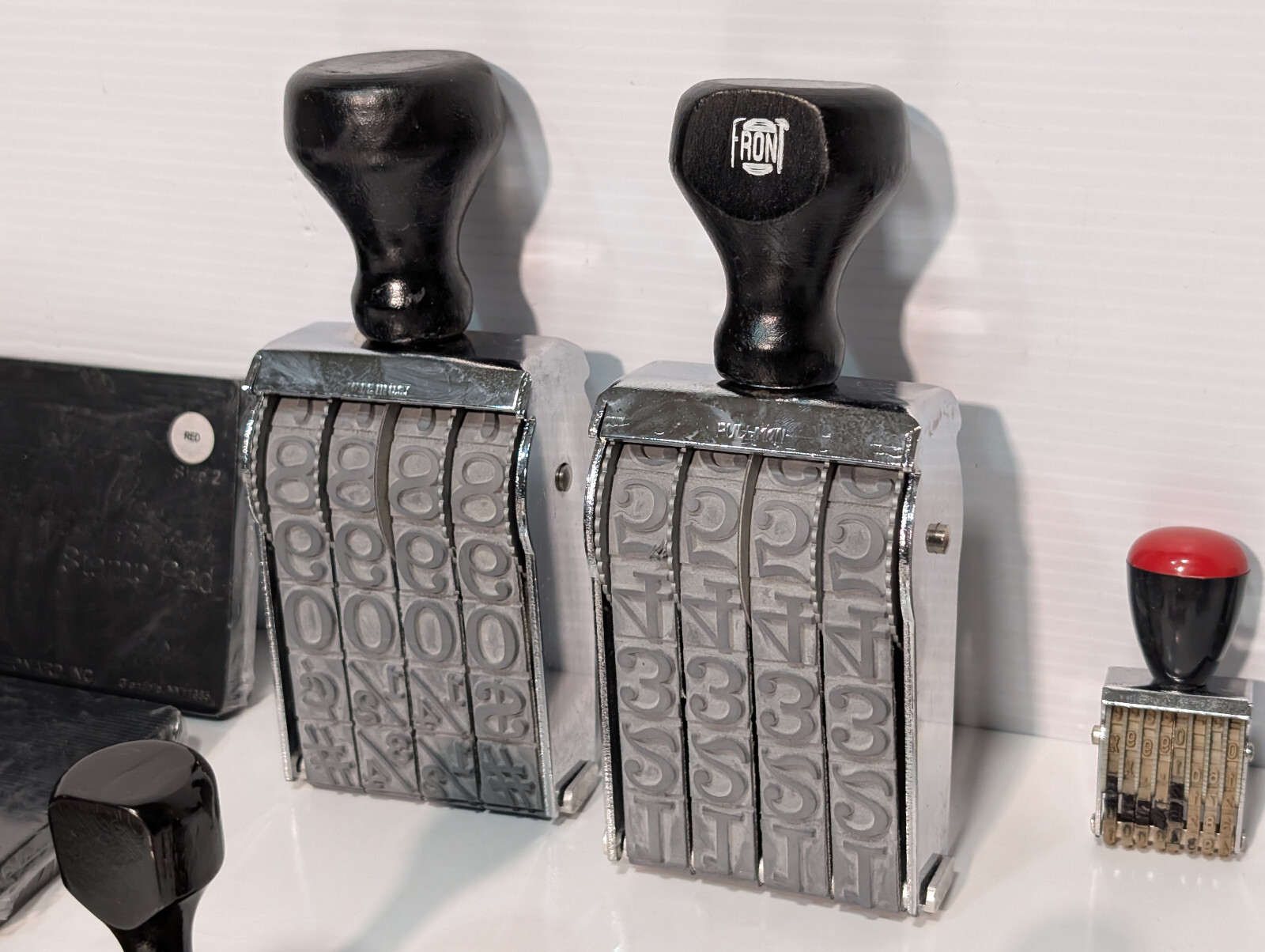 Lot of 25: Assorted Commercial, Retail, Stamps, Stamp Pads, Band, Type Font