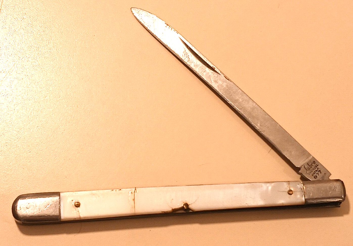 Sabre Stainless Steel Japan 677 Folding Fruit Melon Knife White Celluloid Handle