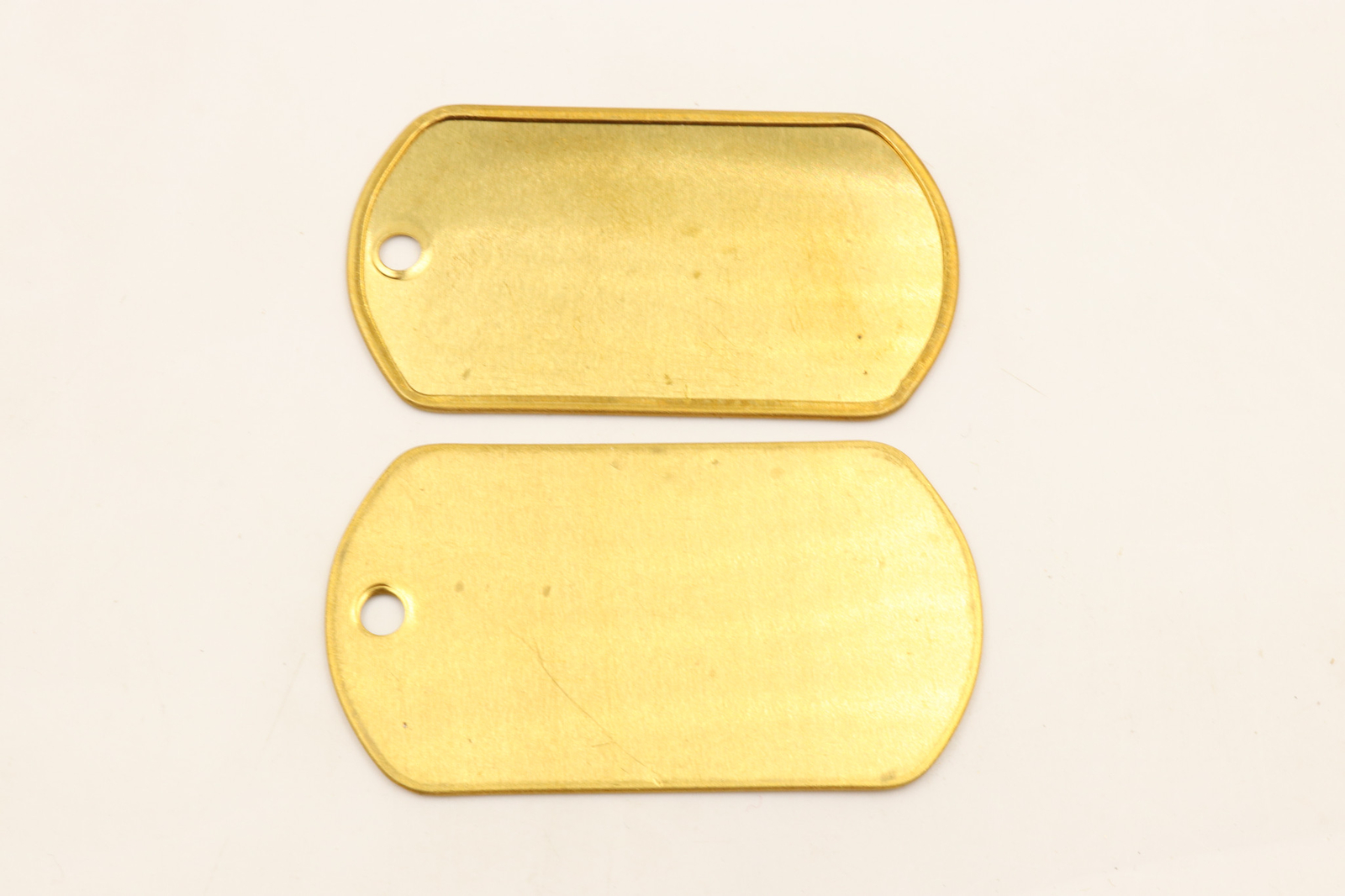Box of 100 Brass Military Blank Rolled Edge Dog Tags