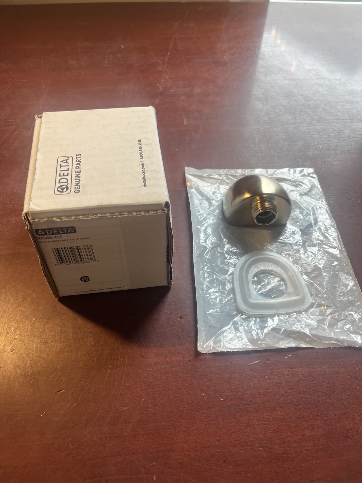 Delta 50560-CZ Water Supply Elbow For Hand Shower With Champagne Bronze *READ*