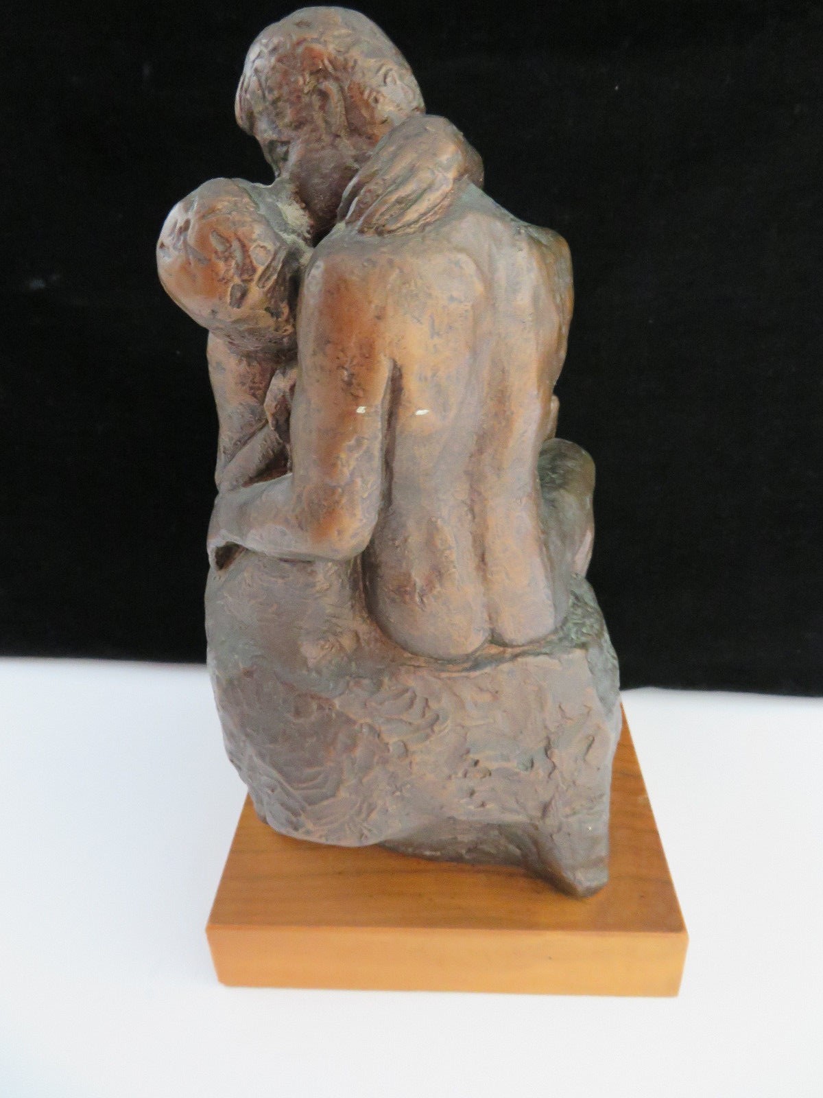 The Kiss Molded Statue on Wood Base