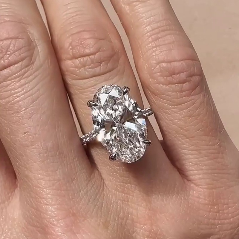 6.3 TCW Oval Cut Moissanite Hidden Halo Engagement Ring In 14k White Gold Plated