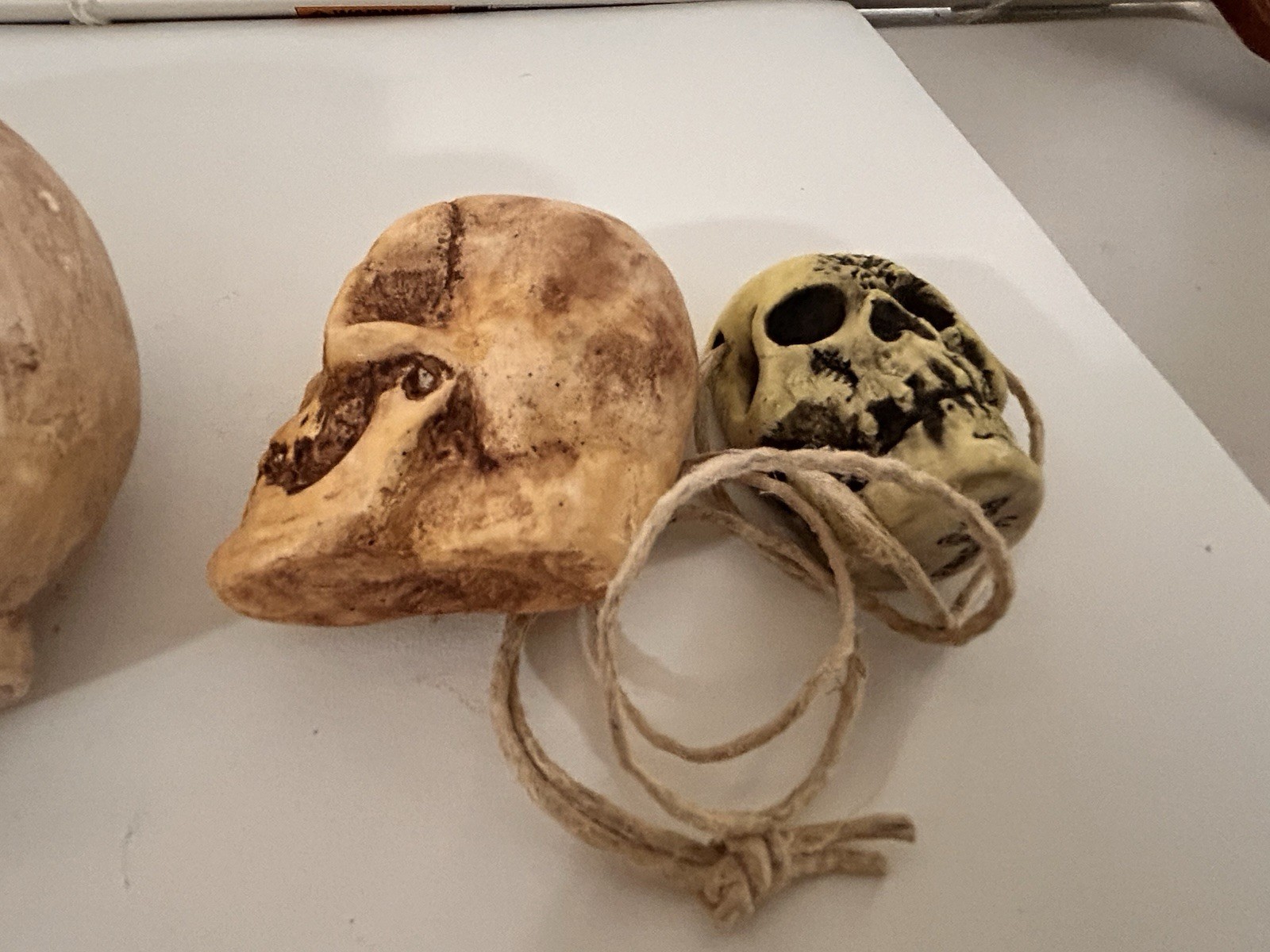 4 EA. RANDOTTI ORIGINALS LARGE, MEDIUM, PIXIE,& FLAT BACK PIXIE SKULLS ALL GLOW