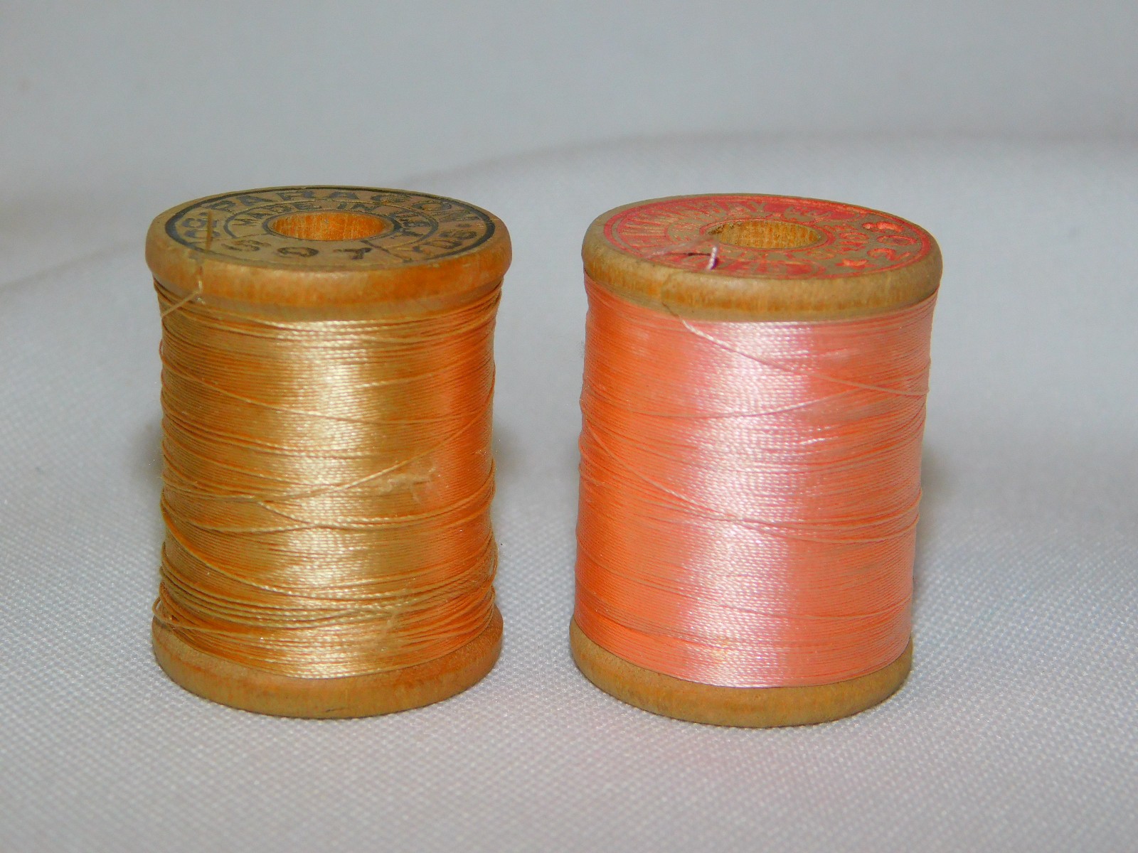 2 Vintage PARAGON BELDING HEMINWAY PURE SILK THREAD Wooden Spools Pink Ivory