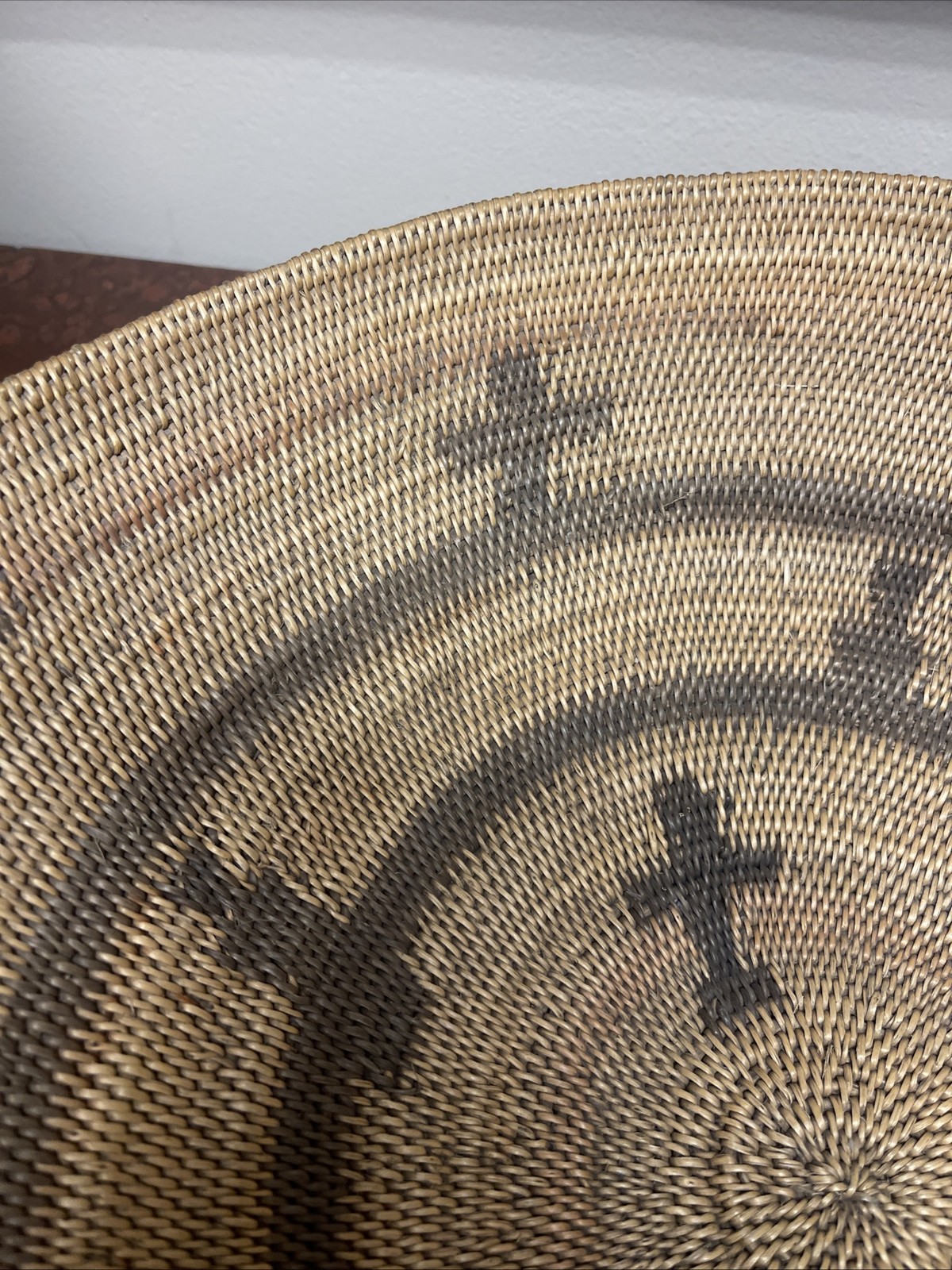 Woven Apache pictorial 17 1/4” basket with geometric and symbolic designs.