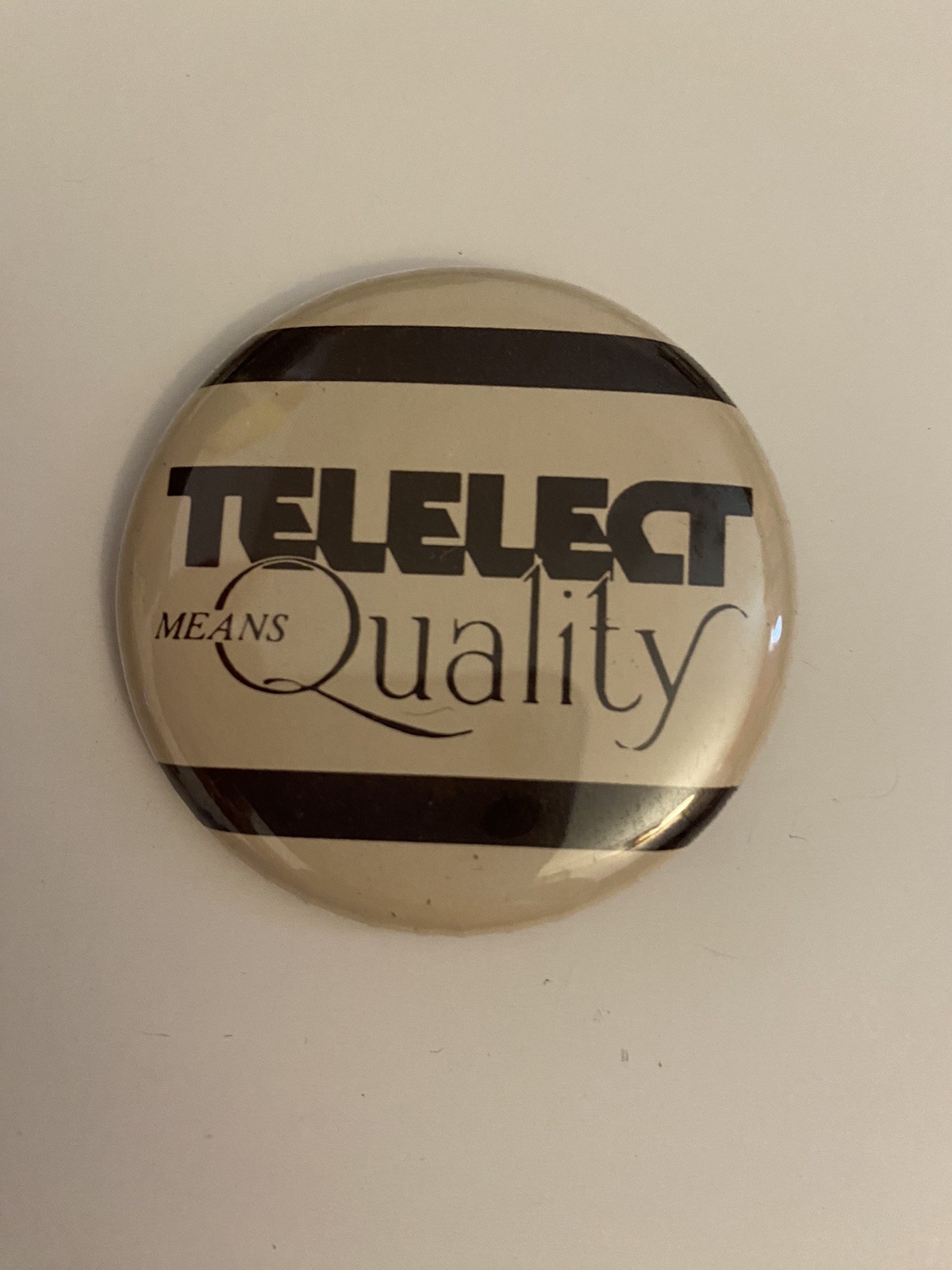 Telelect Means Quality Pin Back Button P86