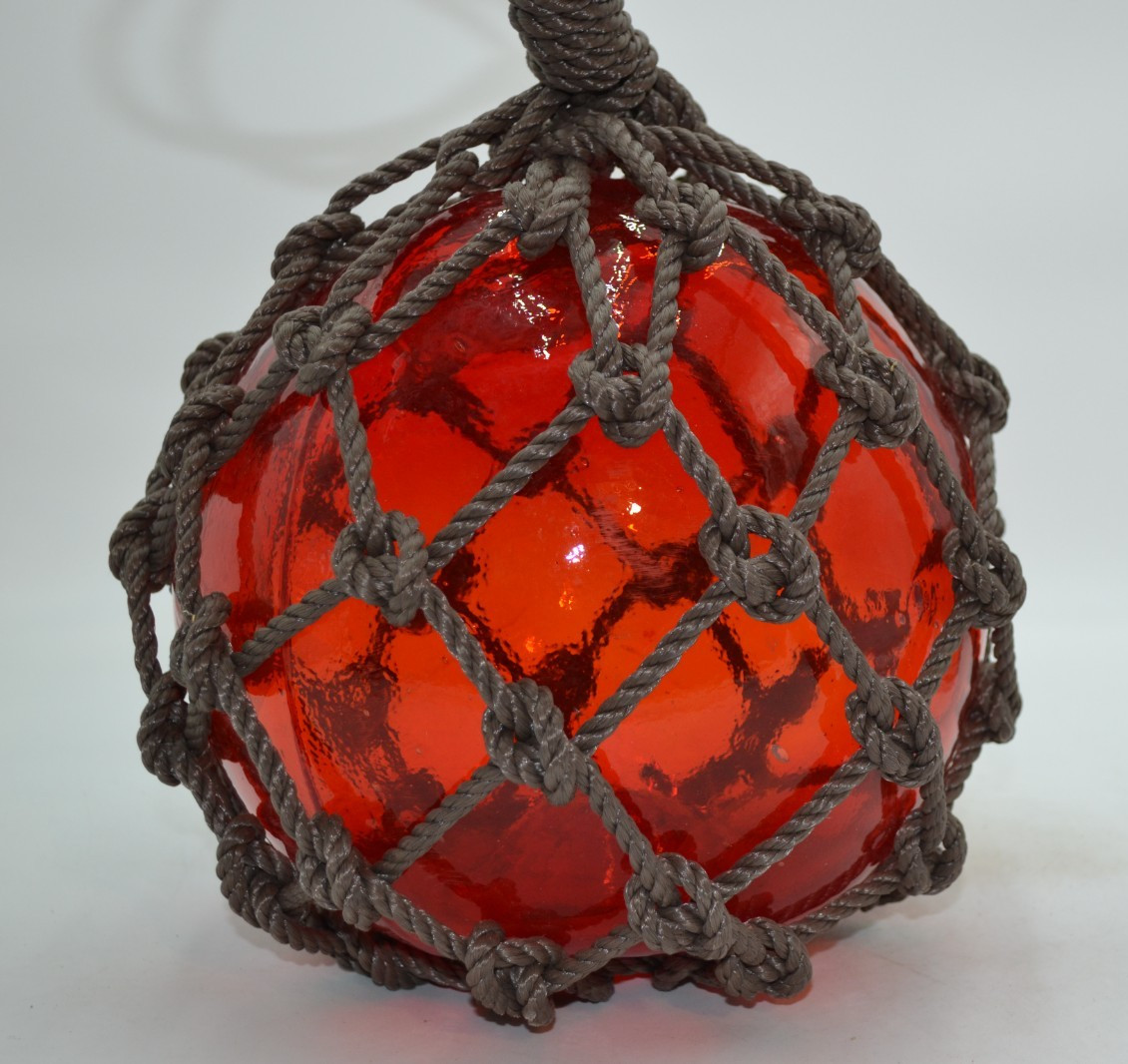 VINTAGE GLASS FISHING FLOAT IN RED AMBER