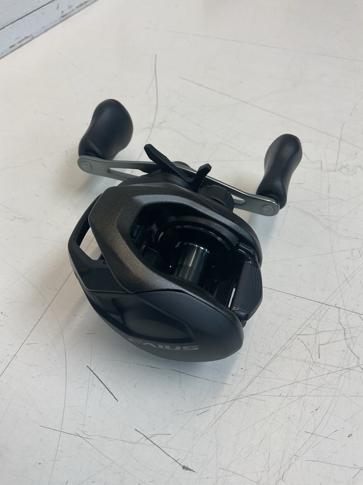 SHIMANO "CAIUS-150-HG-C" BAITCASTER--7.2.1. GR--R-HAND (NO-BOX)