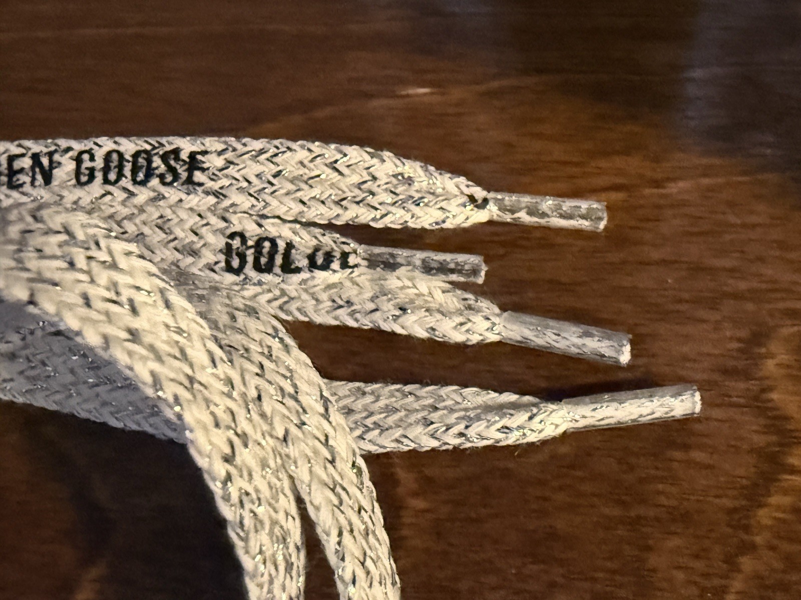 $95 Golden Goose Silver Lurex Laces with Contrasting Black Logo