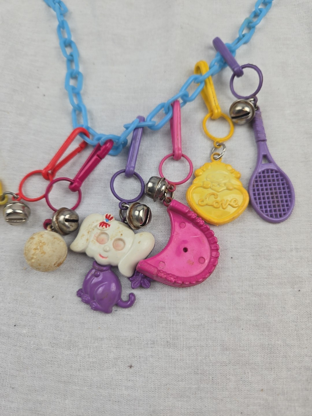 Vintage 80s Plastic Clip On Bell Charm Necklace 5 Charms