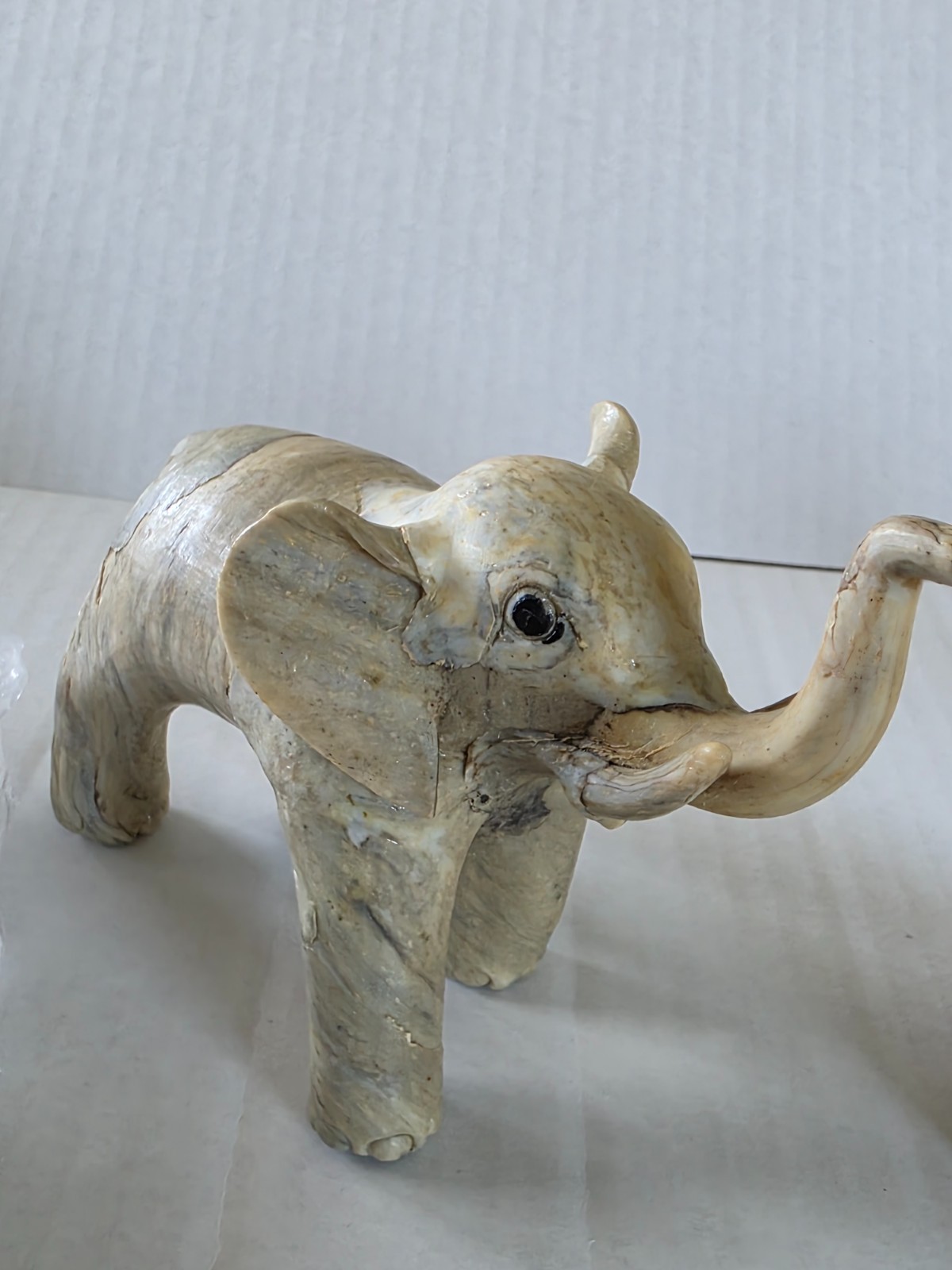 Three elephant figurines