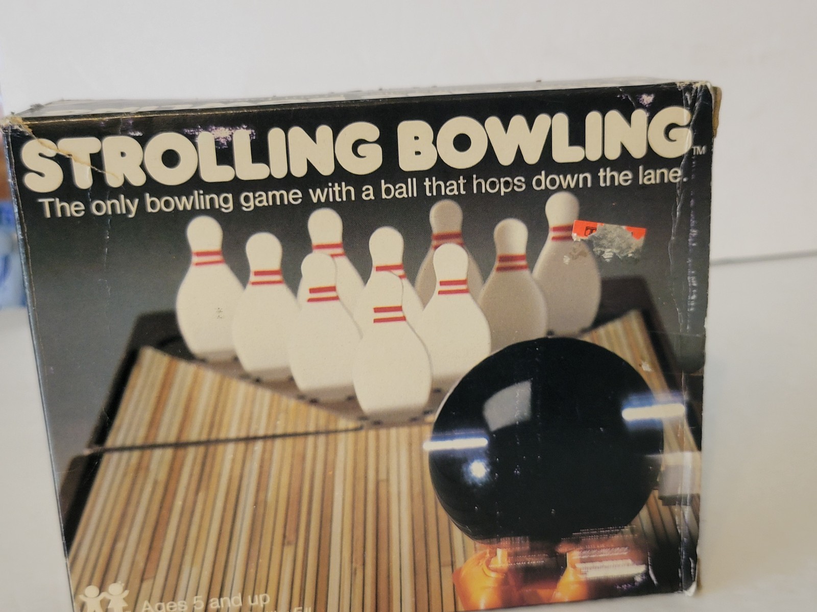 VINTAGE 1980s TOMY WIND UP STROLLING BOWLING GAME WITH BOX WORKING