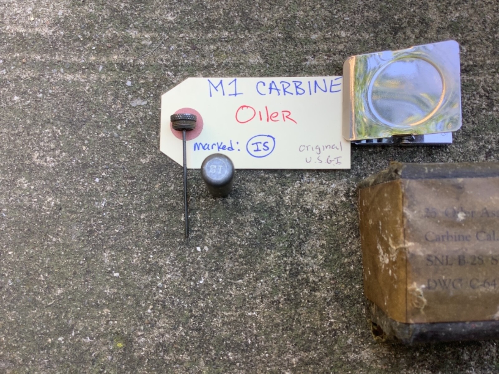 Original WW2 USGI M1 Carbine Oiler for Retaining Sling marked IS NOS