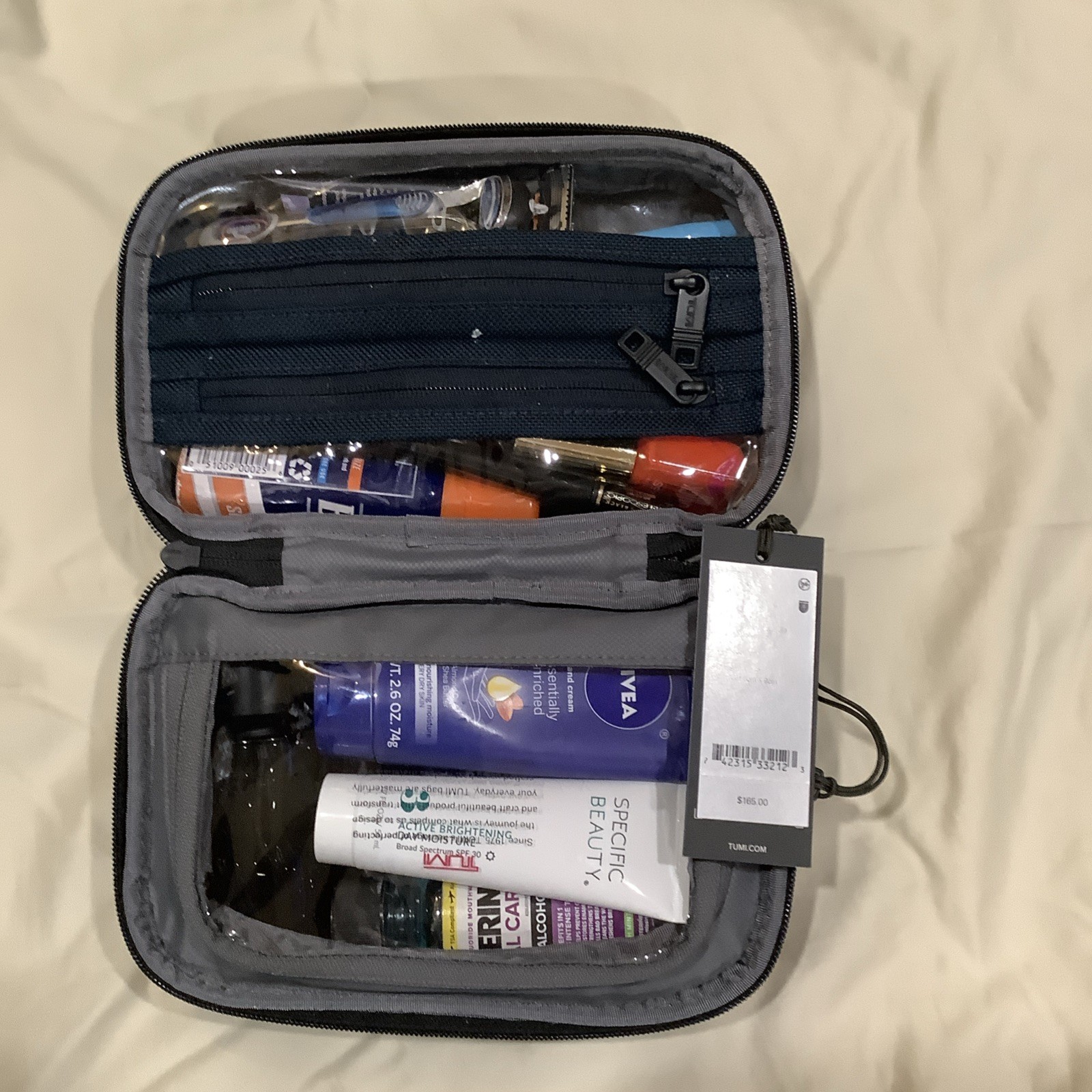 TUMI 100% Leather Split Travel Kit. Black Brand New Kit Valued At $165.00.