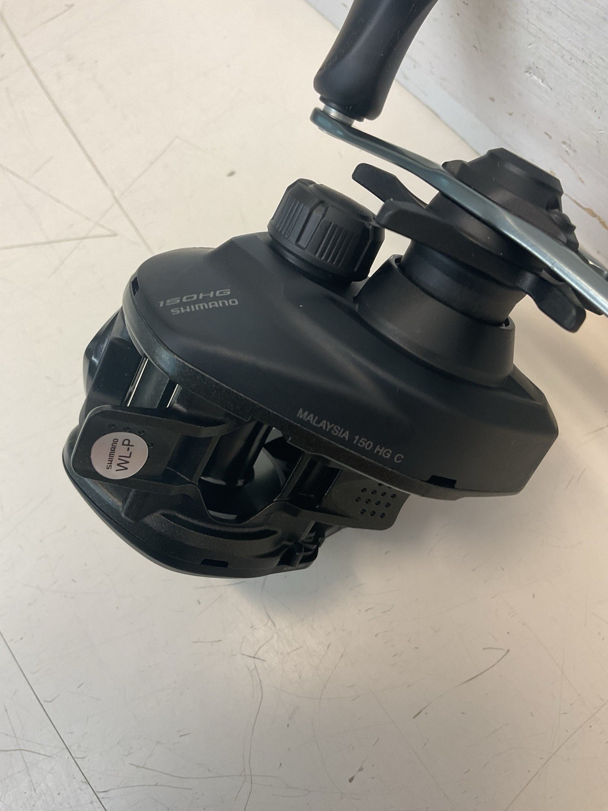 SHIMANO "CAIUS-150-HG-C" BAITCASTER--7.2.1. GR--R-HAND (NO-BOX)