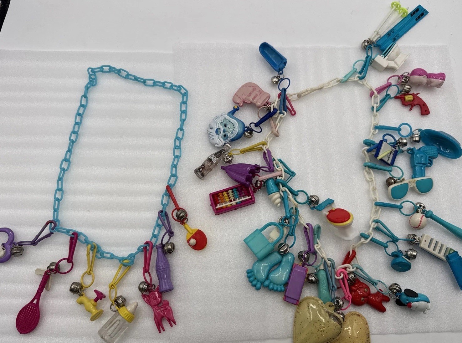 Vintage 1980's Plastic Bell Charm Clip Necklace w 2 Chains and 34 Charms.