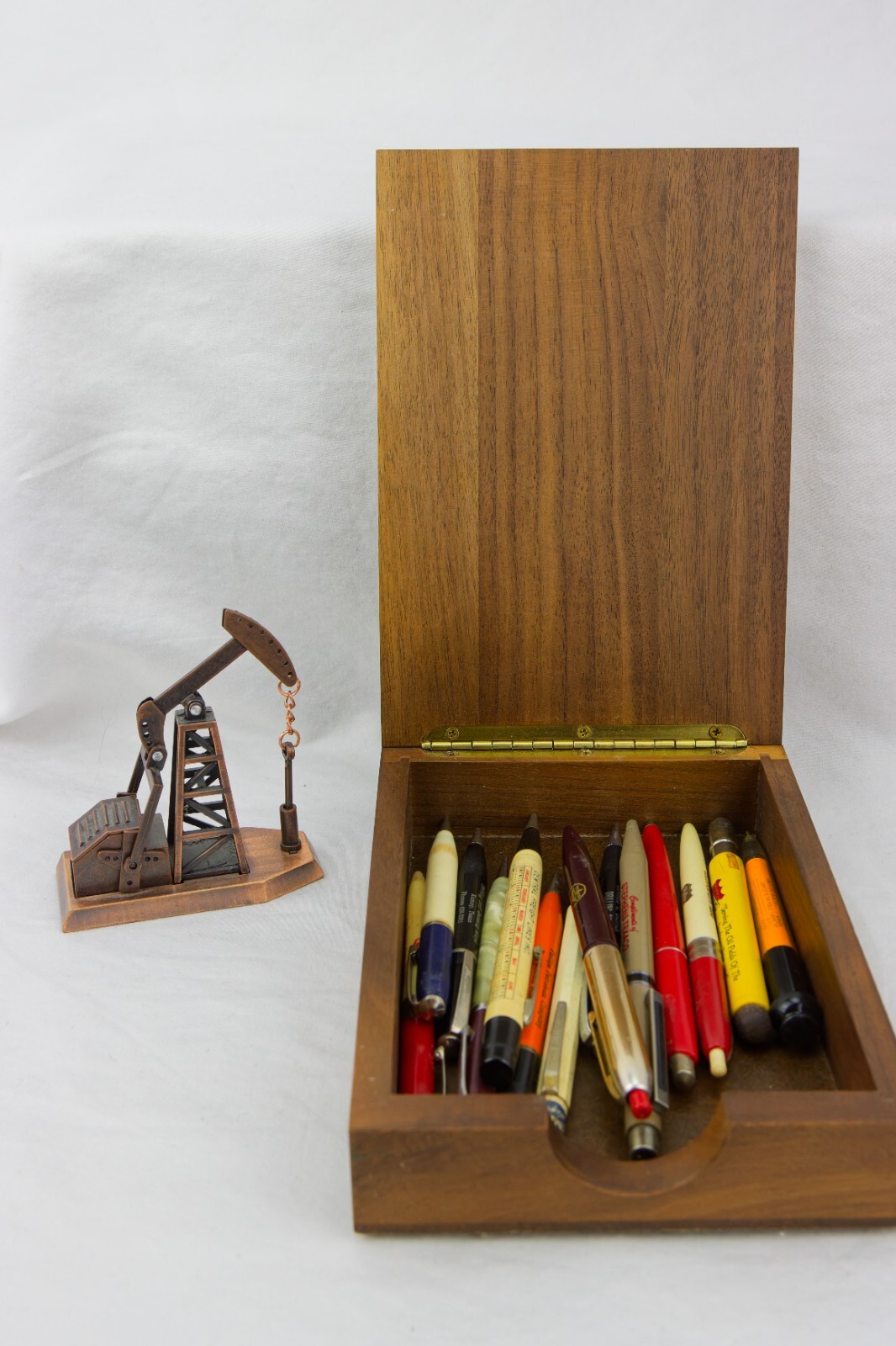 Oil, Trucking and Land Advert Items; Wood Box, Pencil Sharpener and Pens/Pencils