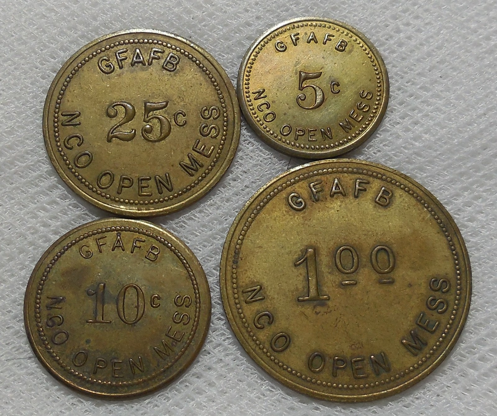 GRAND FORKS AIR FORCE BASE 5¢ 10¢ 25¢ & $1.00 BRASS TRADE TOKENS GFAFB