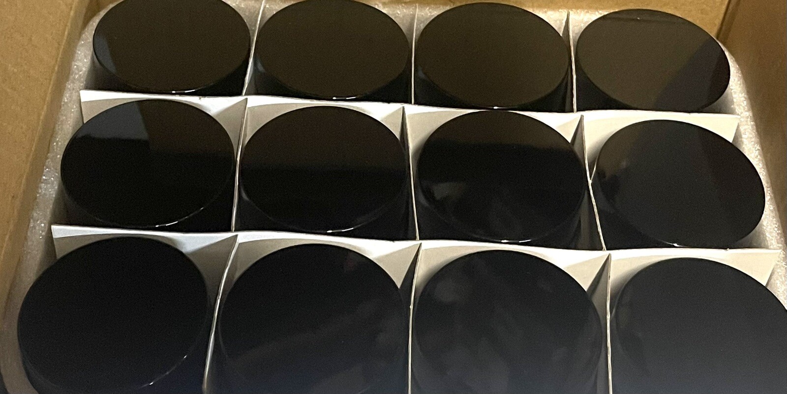 Amber 1 oz Round Glass Jars with Inner Liners and Black Lids, pack of 12