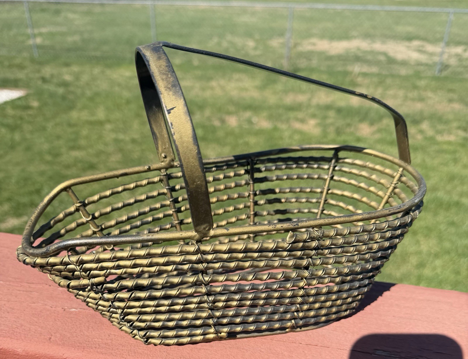 French Brass Finish Metal Twisted Or Rope Texture Wine Bottle Caddy 10.5”L