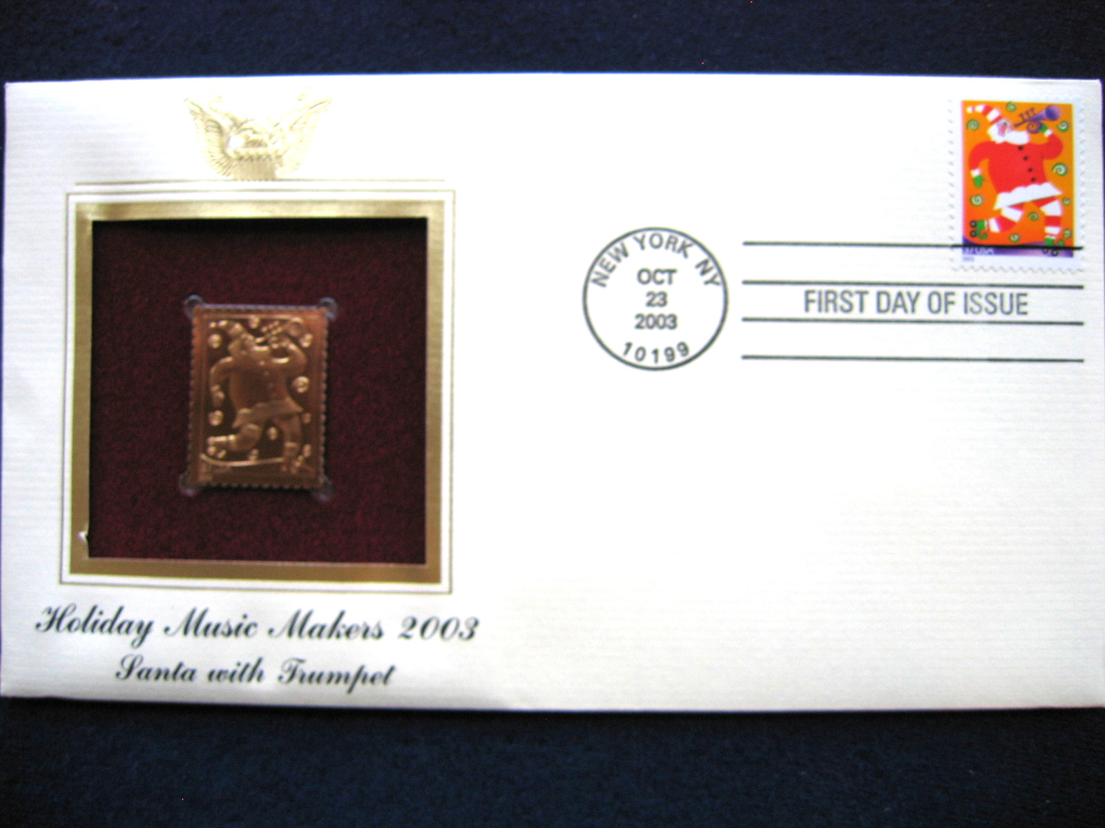 2003 Holiday Music Makers Santa With Trumpet replica Gold Golden Cover Stamp