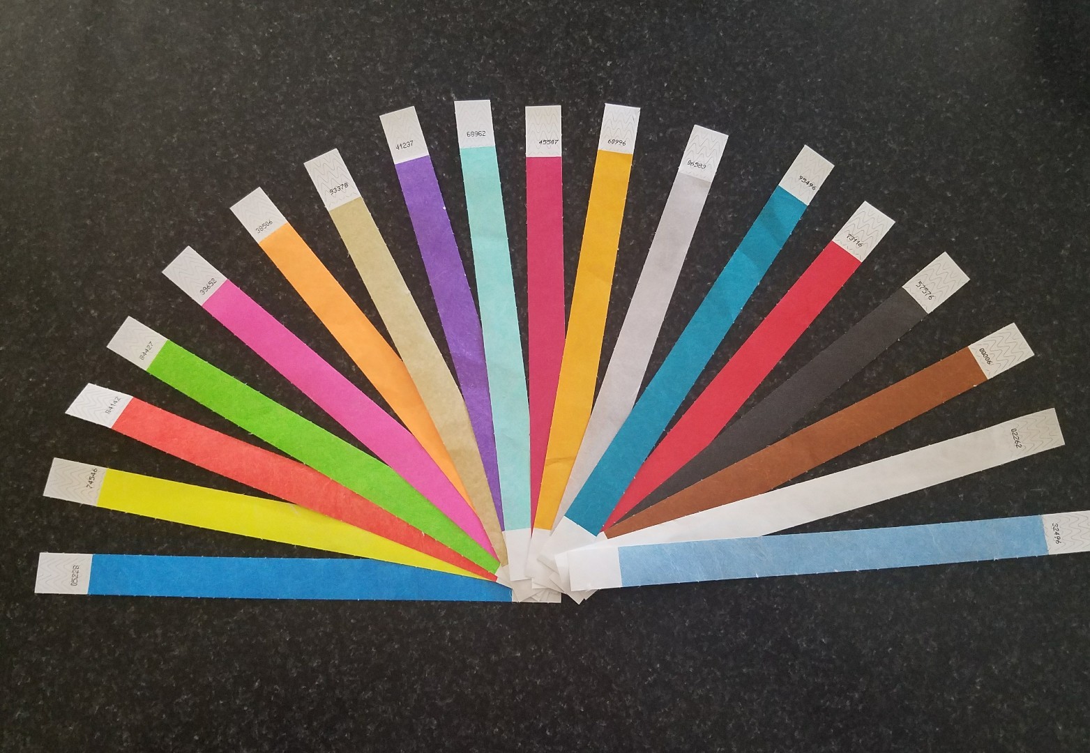 180 3/4" ASSORTED TYVEK WRISTBANDS, 10 EACH OF 18 COLORS. PAPER WRISTBANDS