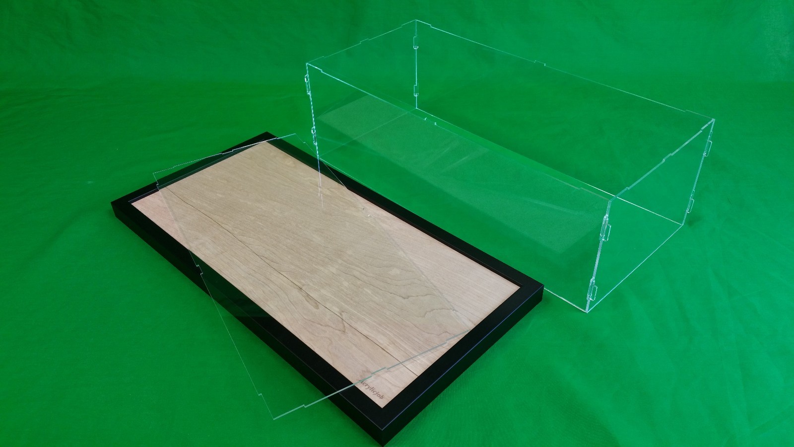 36"L x 10"W x 12"H Display case with 3/16" thick acrylic black wood frame base
