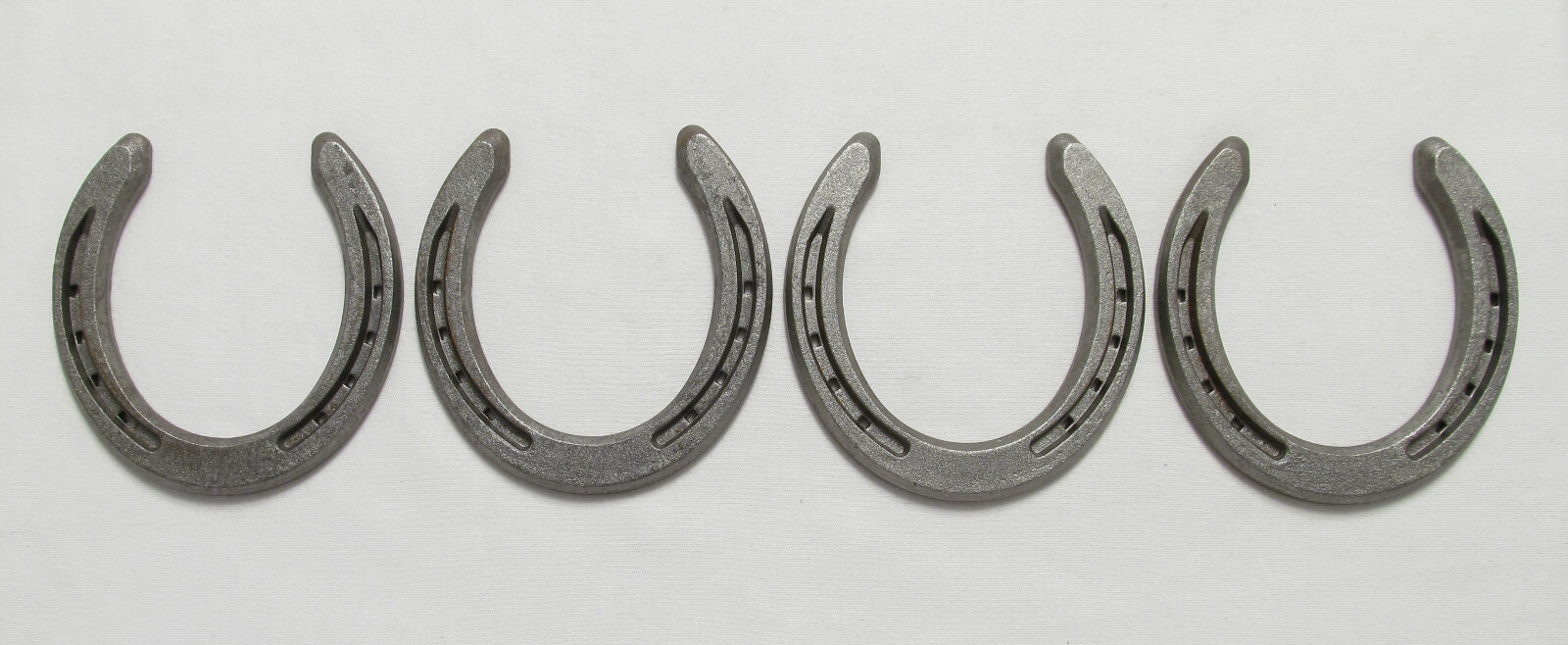 Lot of (4) Real Horseshoes - Medium Size Horse Shoes (Metalwork Arts Craft)