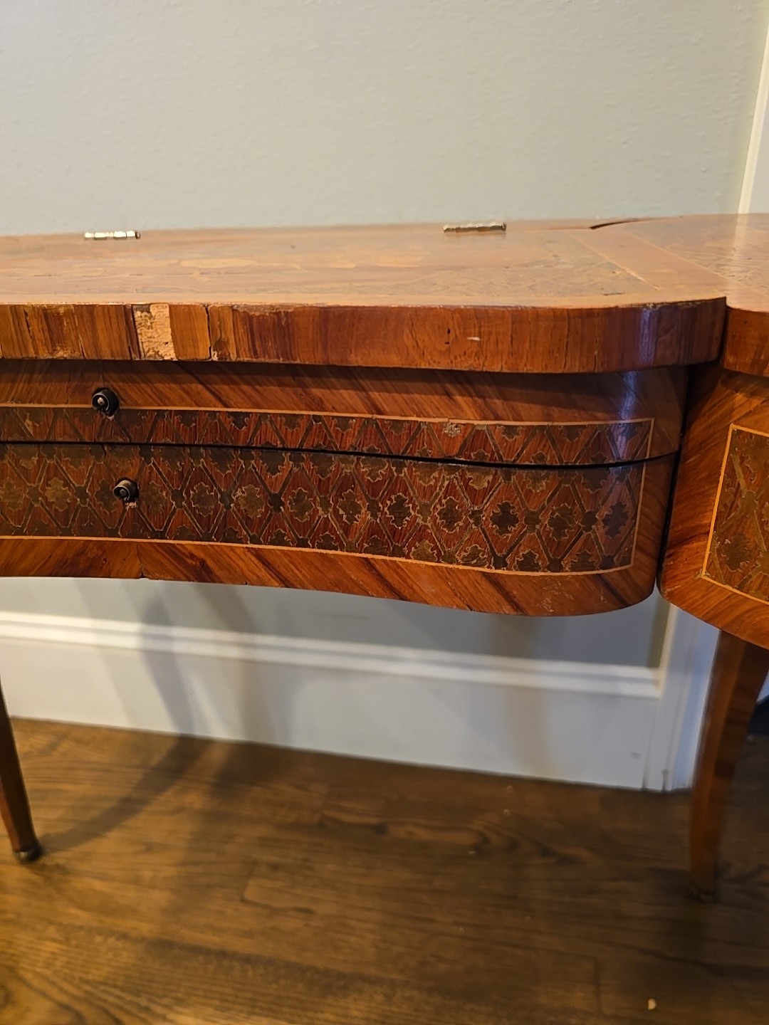 "Antique vanity table from the late 1800s with intricate inlay & a hidden mirror