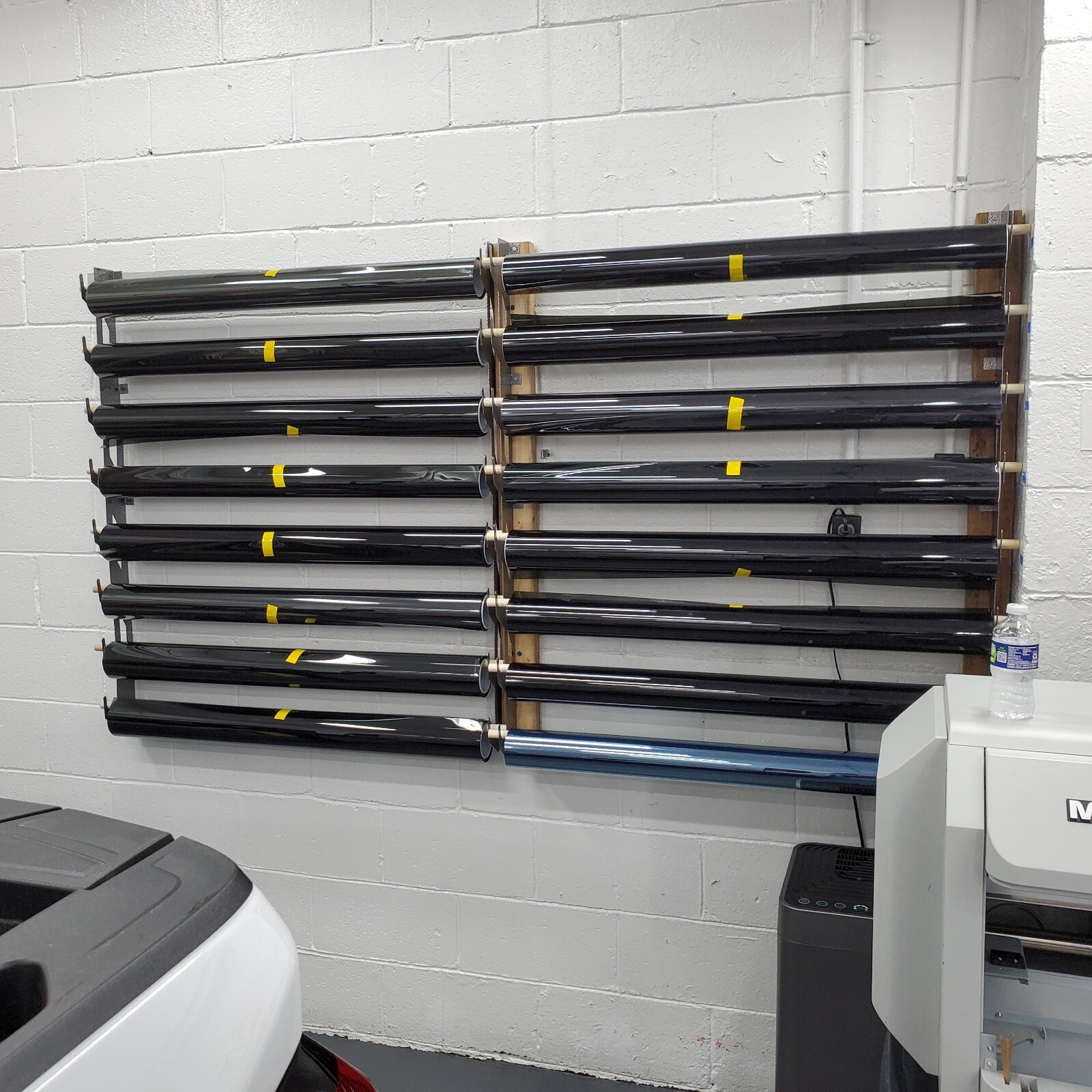 Wall Mounted Tint and Vinyl Wrap rack: The Perfect Solution for Organizing Your