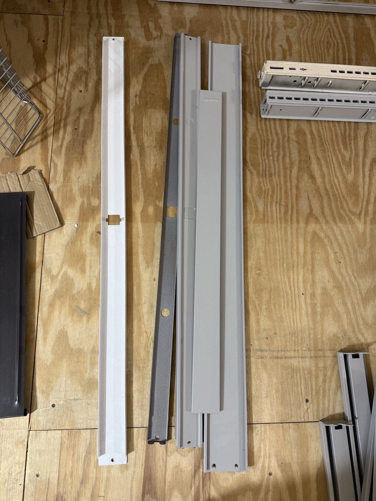 HUGE lot of pallets of Used Lozier Shelving shelves, components, glass cases