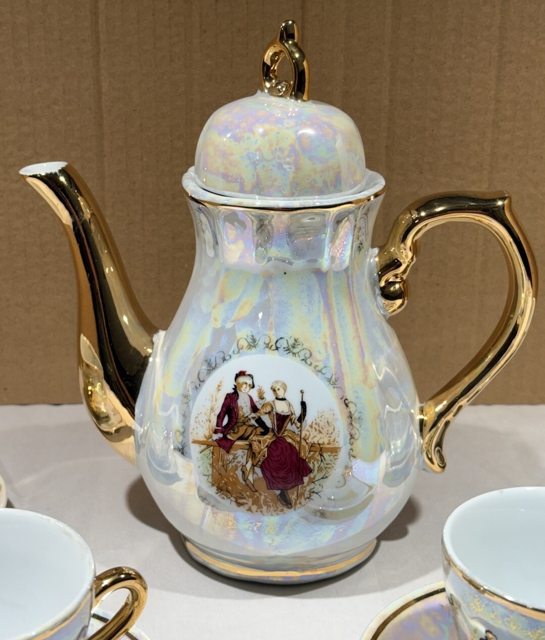 Romeo And Juliet Tea Pot 4 Tea Cups 4 Saucers Gold Trim Handles Iridescent White
