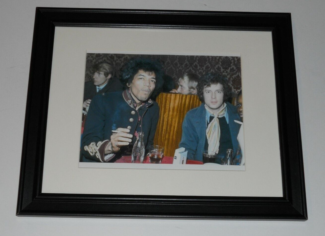 Framed Jimi Hendrix / Eric Clapton 1966 at Dinner Table Guitar Gods 14" x 17"