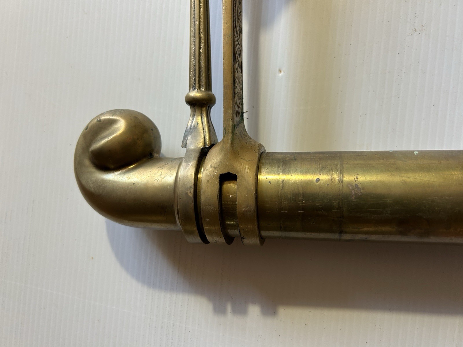 ANTIQUE BRASS BAR END RAIL AND FANCY DECORATED RAIL HANGERS