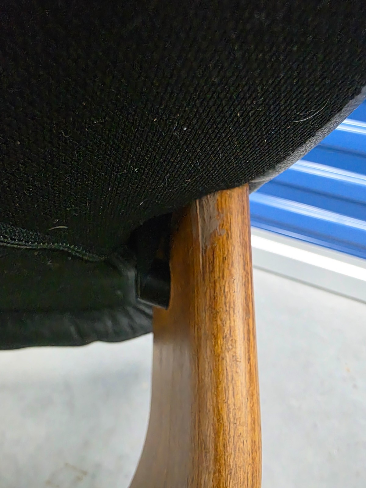 Ekornes Stressless Black Colored Leather Ottoman | Teak Stained Wood Base