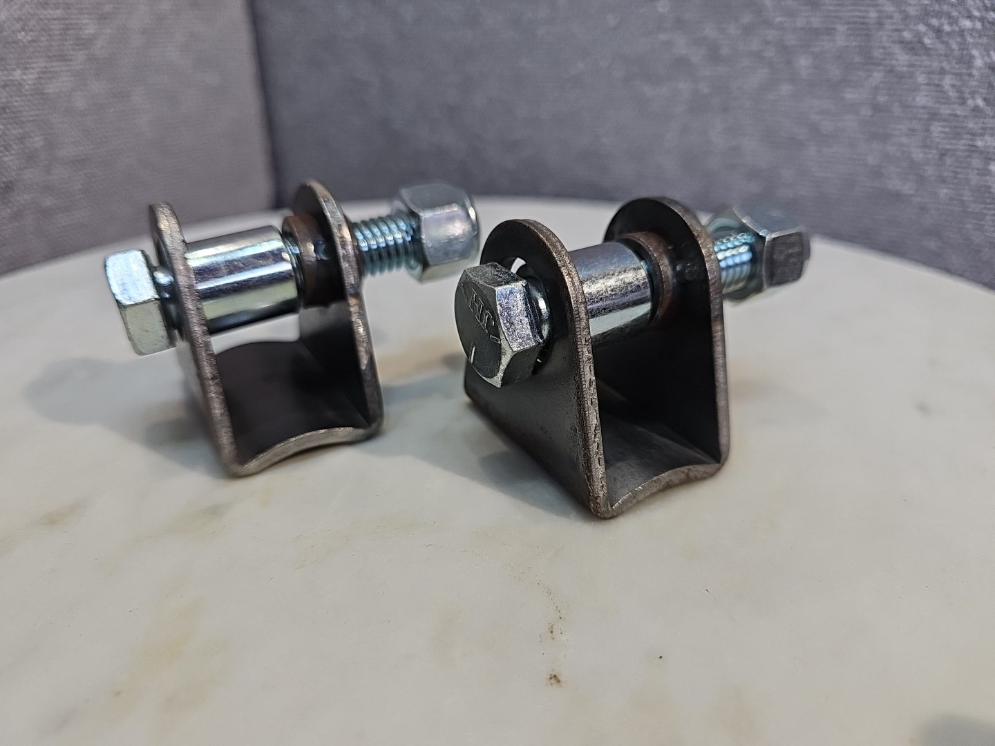 SHOCK COIL OVER BRACKET FLAT MOUNT LOWER NARROW STEEL 1-1/4" WIDE W/BOLT WELD-ON