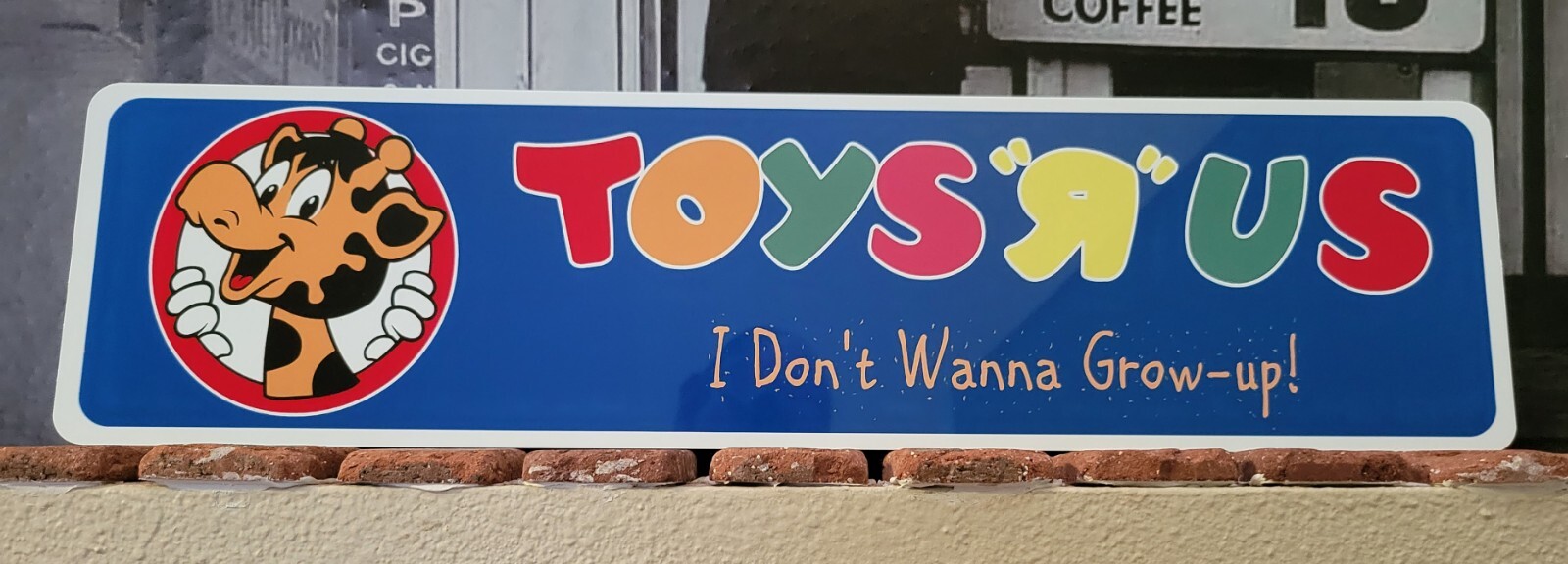 Toys R Us aluminum sign 6" x 23" I Don't Wanna Grow-Up!