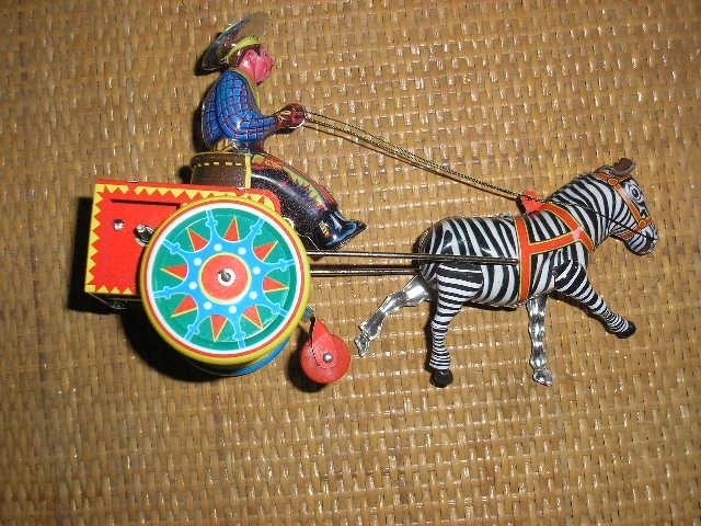 ZEBRA Tin TOY wind up cowboy & cart based on german Galop toy Schylling