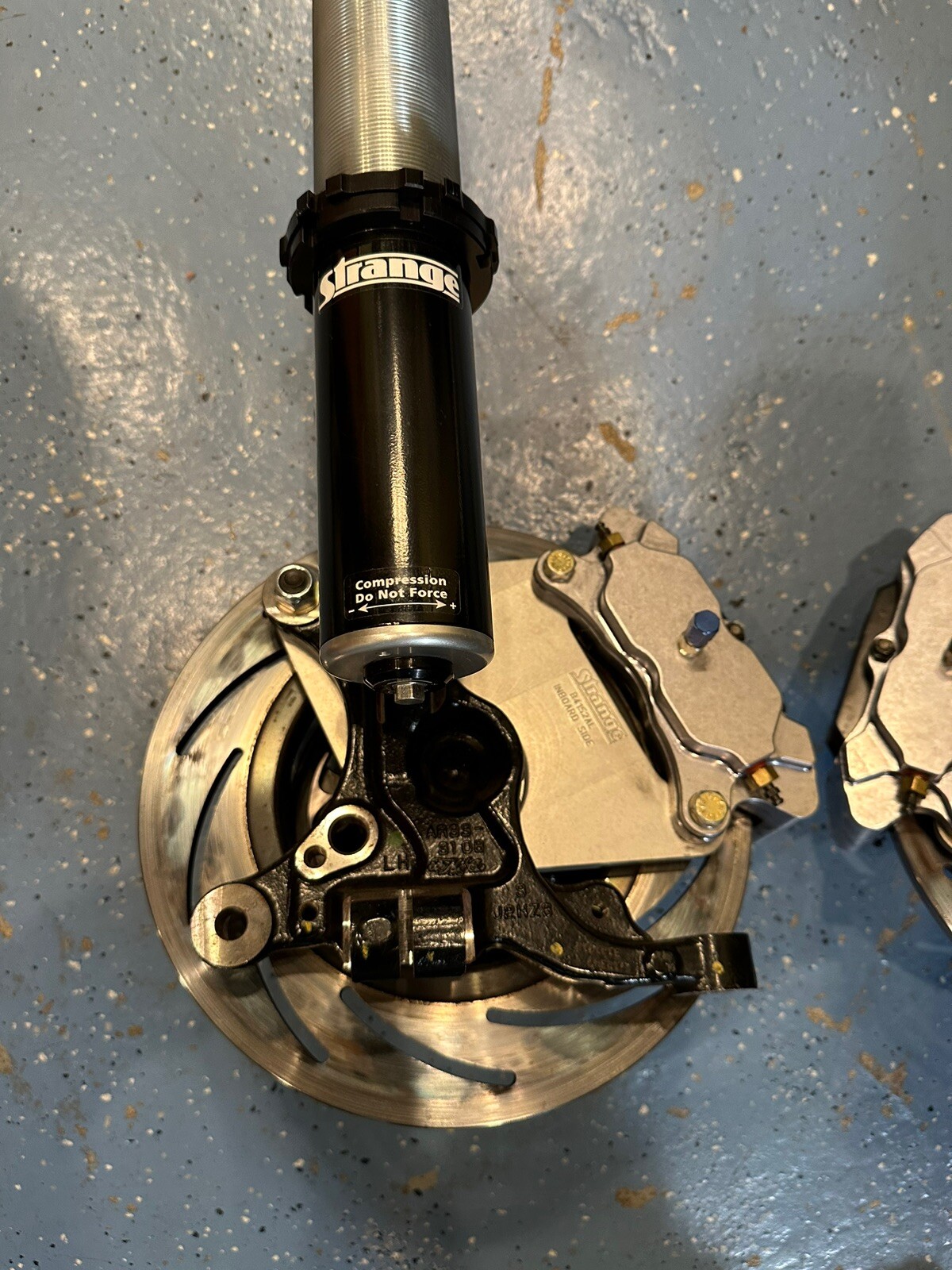 Strange Engineering Ford S197 Mustang Super Cobra Jet Struts, Hubs, and Brakes