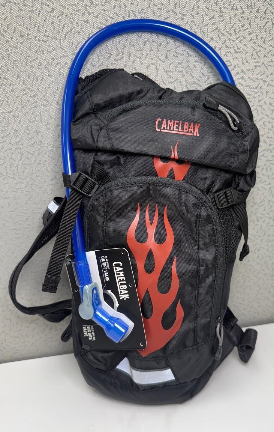 CamelBak Mini M.U.L.E. Kids Hydration Bag 50oz, Black/Flames