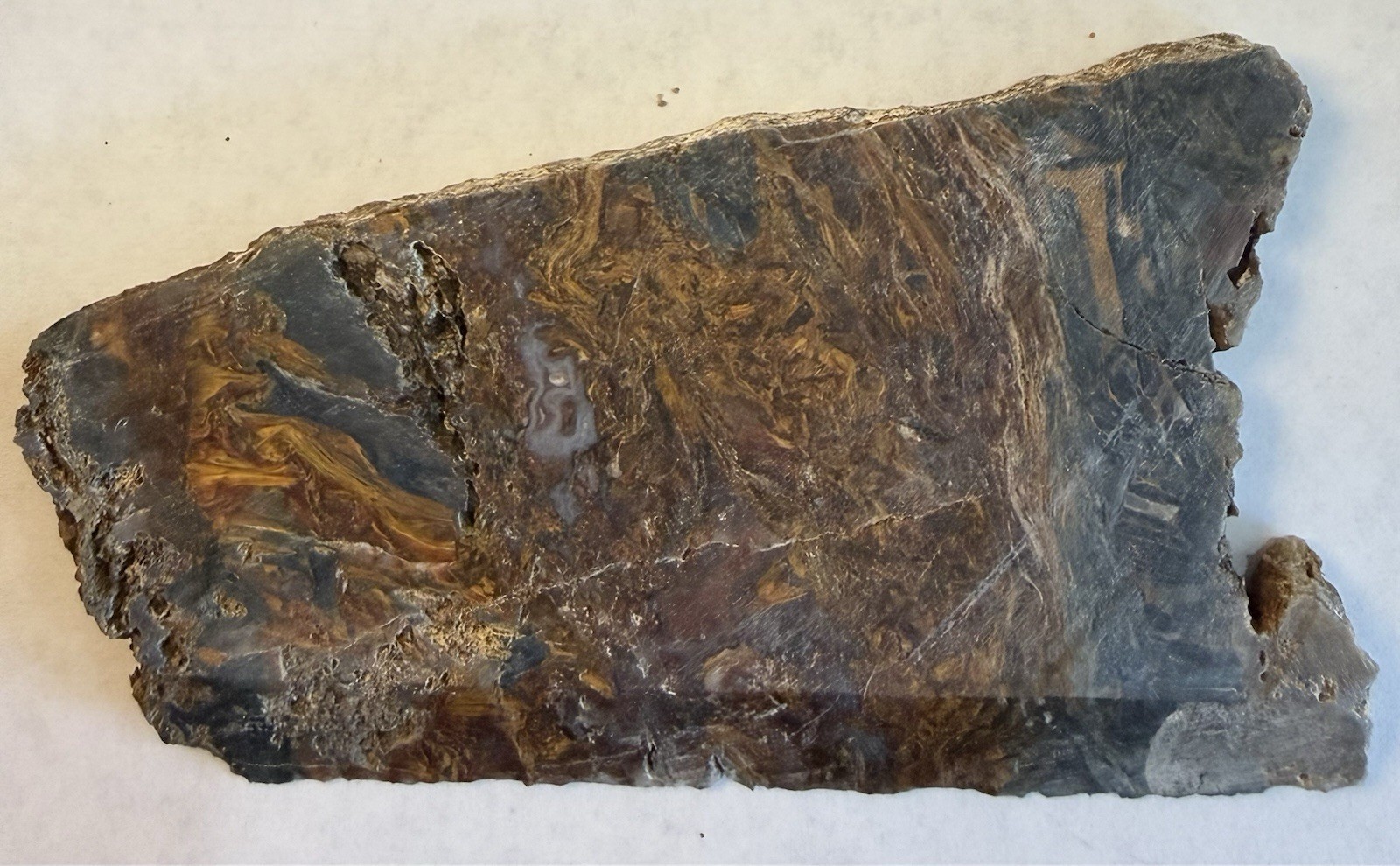 Pietersite Unpolished Slab. 4 5/8” x 2 7/8” x .25”, 3.7 Ounce. Imperfections.